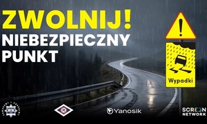 plakat - droga i napis zwolnij niebezpieczny punkt!